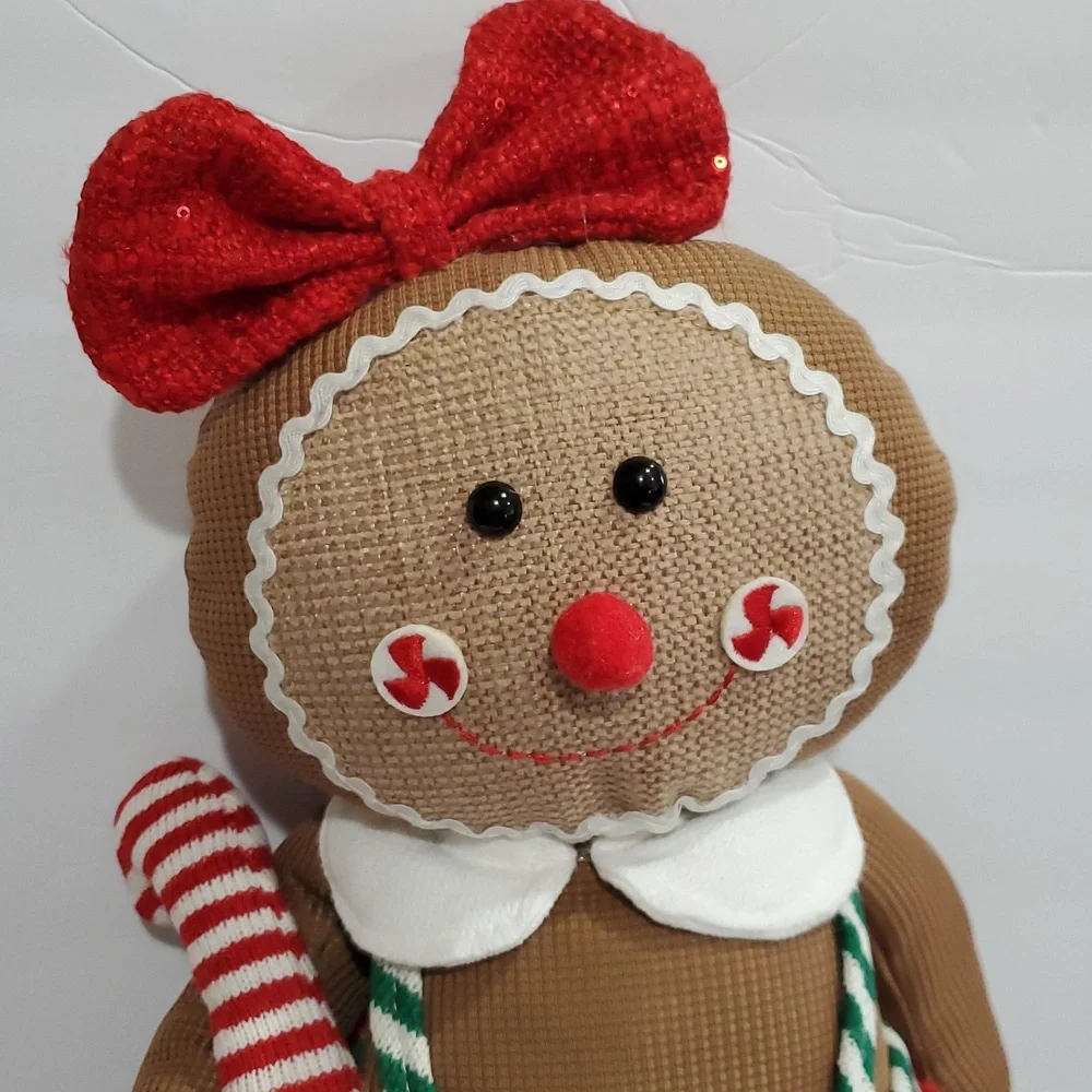 Gingerbread woman in red sequin boucle bow and‎ jumper Christmas holiday plushie